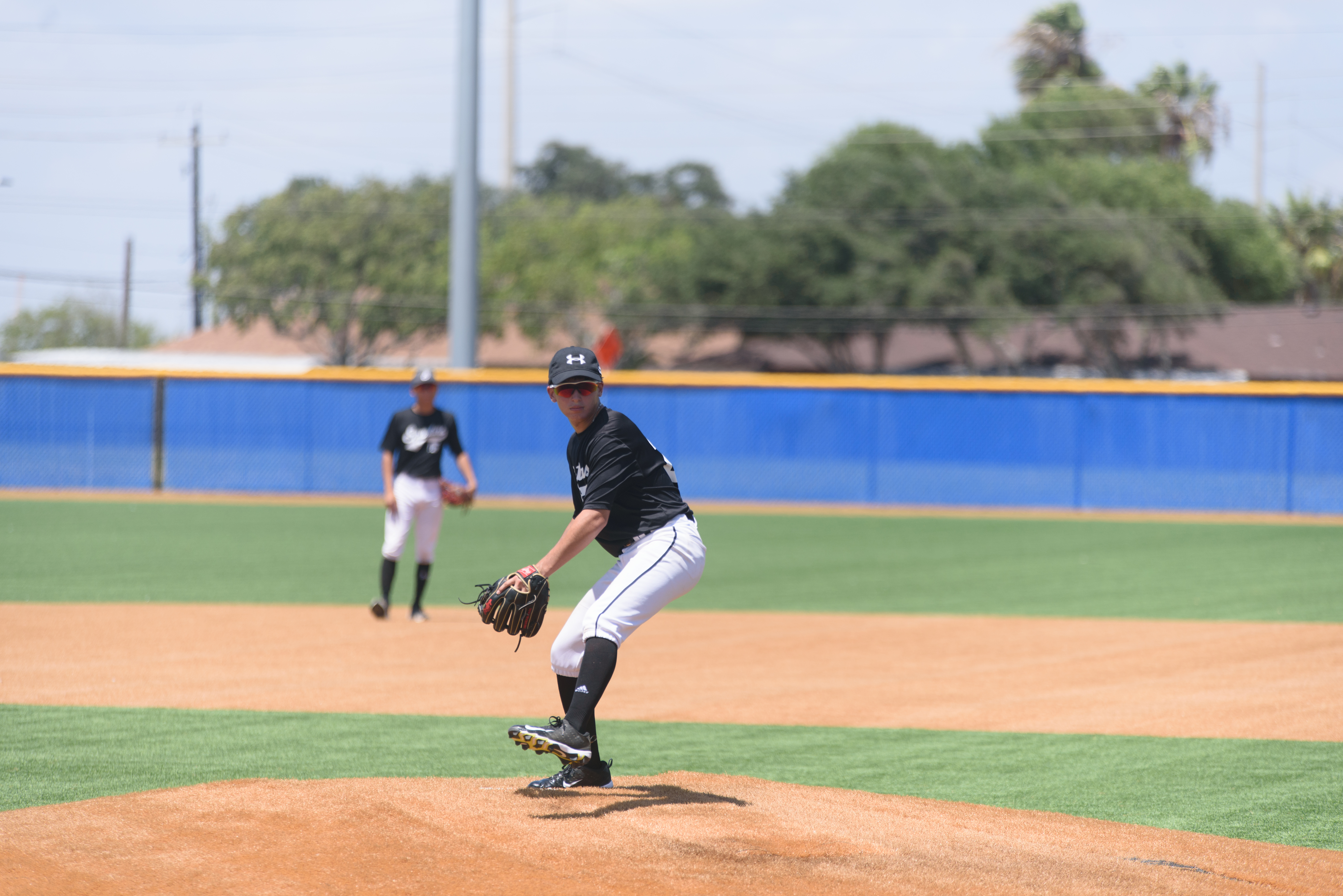 Young Baseball player pitching